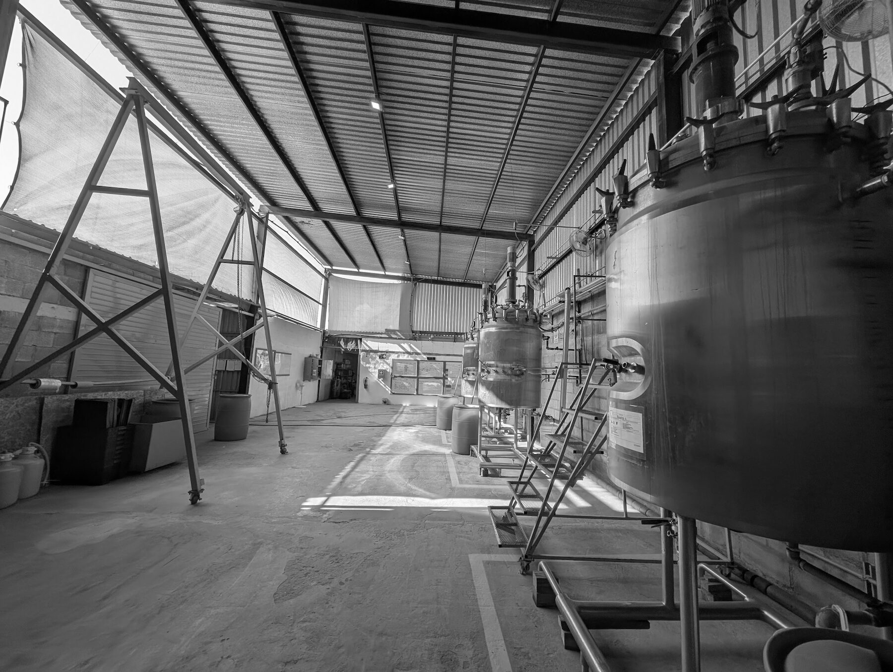 Granatum's bio-manufacturing plant: stainless steel reactors and process lines in the production bay.